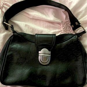 Harley Davidson logo emblem embossed genuine leather purse.